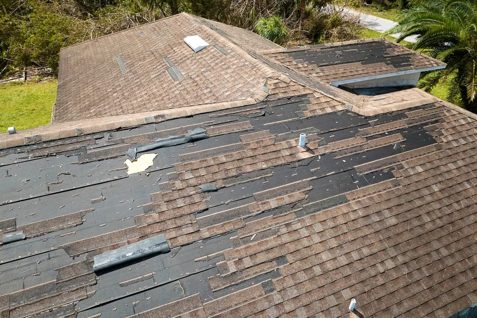 Slate Stone Construction roofing crew at work